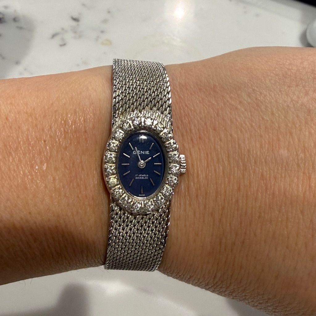 Elegant Silver Swiss Stainless Steel Watch With Blue Dial